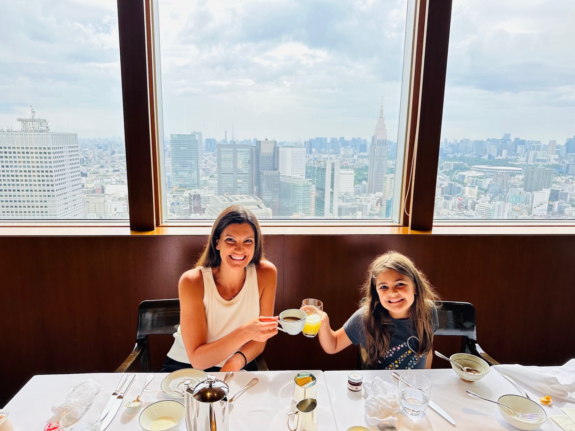 Jennifer and Dylan celebrating together at a restaurant